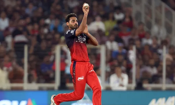 bhuvneshwar kumar 350 wickets t20 record IPL 2026 RCB vs GT